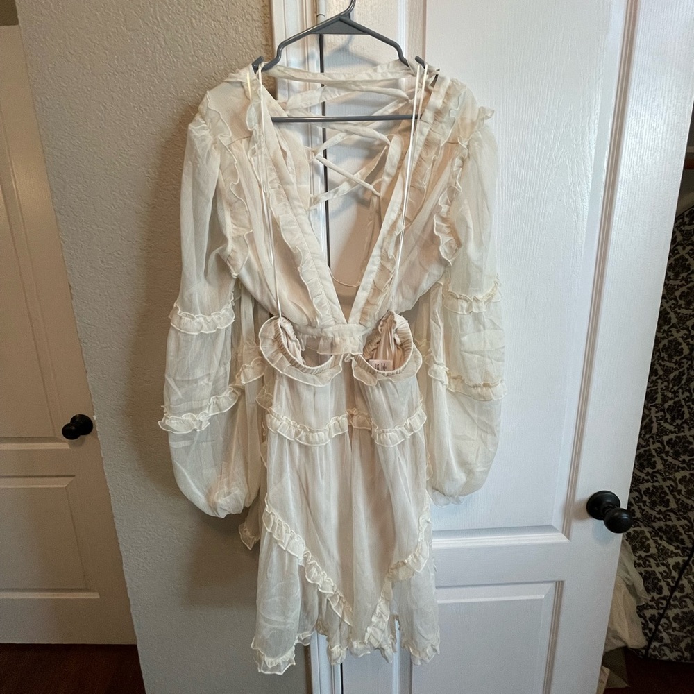 Ivory Ruffle Dress with Criss Cross back and cut out sides